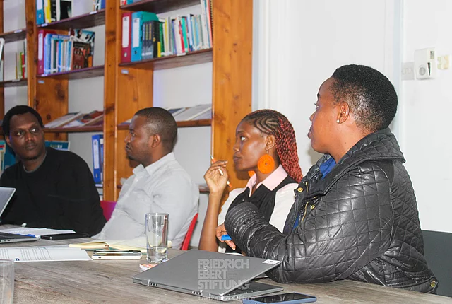 Participants engaging in a discussion during the Vision 2050 Just City workshop