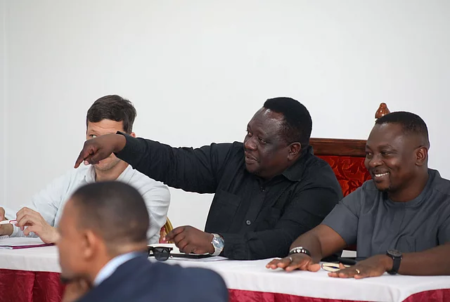 Tumaini Nyamhokya, President of the Trade Union Congress of Tanzania (TUCTA), addresses the trade unions at the Workshop. On the right is Mr. Daniel Oberko, Regional Secretary for Africa & Arab Countries at PSI, and on the left is Mr. Christian Denzin, the FES Tanzania Resident Representative.