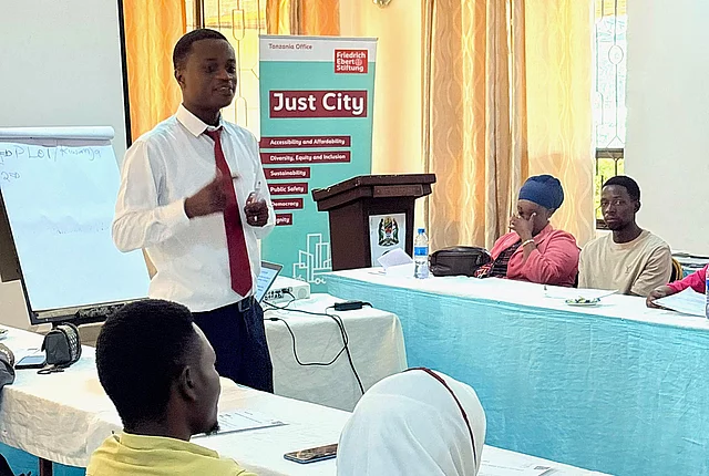 Mr. Emanuel Njavike of Housing LAB leading a session on urban futures and housing justice, challenging participants to rethink what a Just City means for Tanzanian youth during the workshop in Dodoma. Photo: A4DG